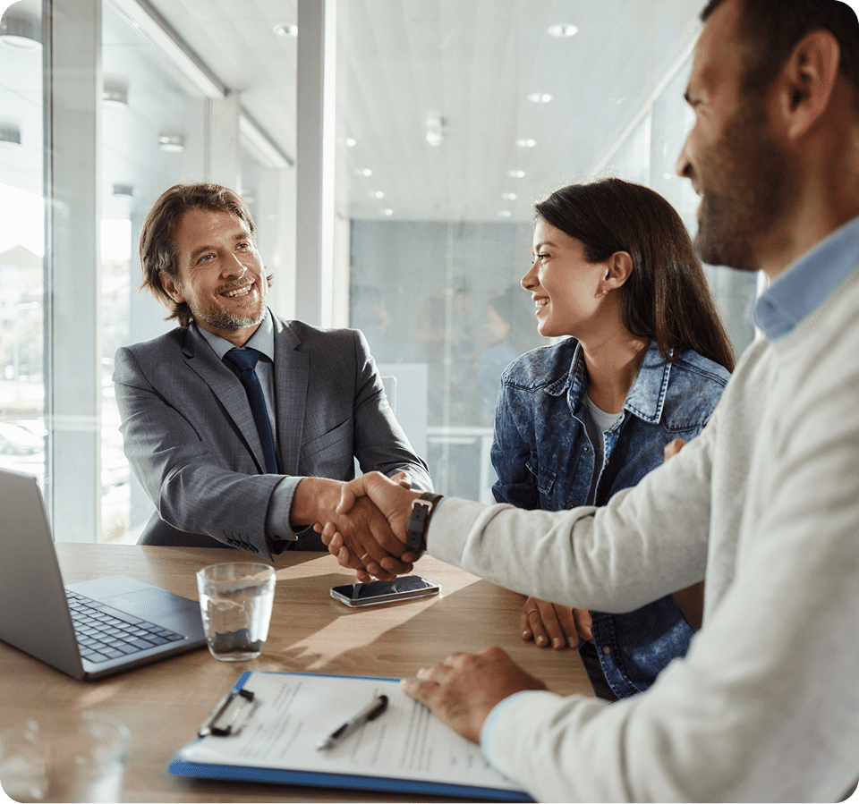 Smiling colleagues in office meeting