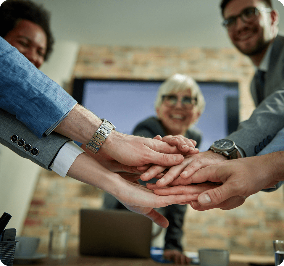 Teamwork hands in a meeting